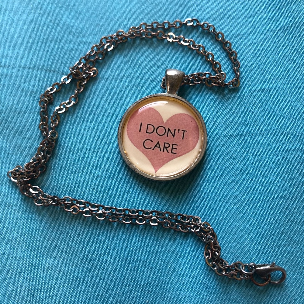 Silver I DON’T CARE necklace
